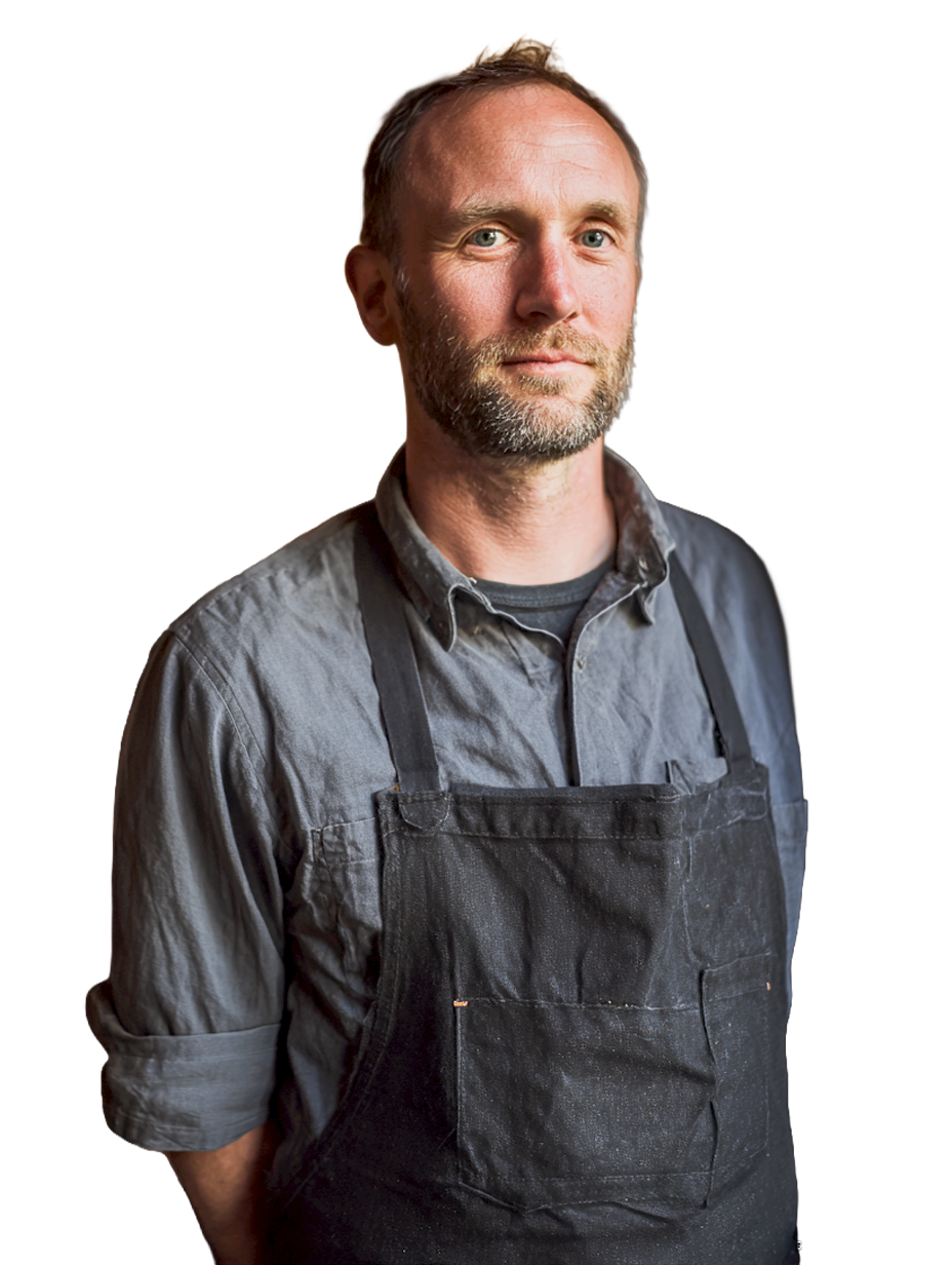 The owner of a design-forward restaurant in his dining room